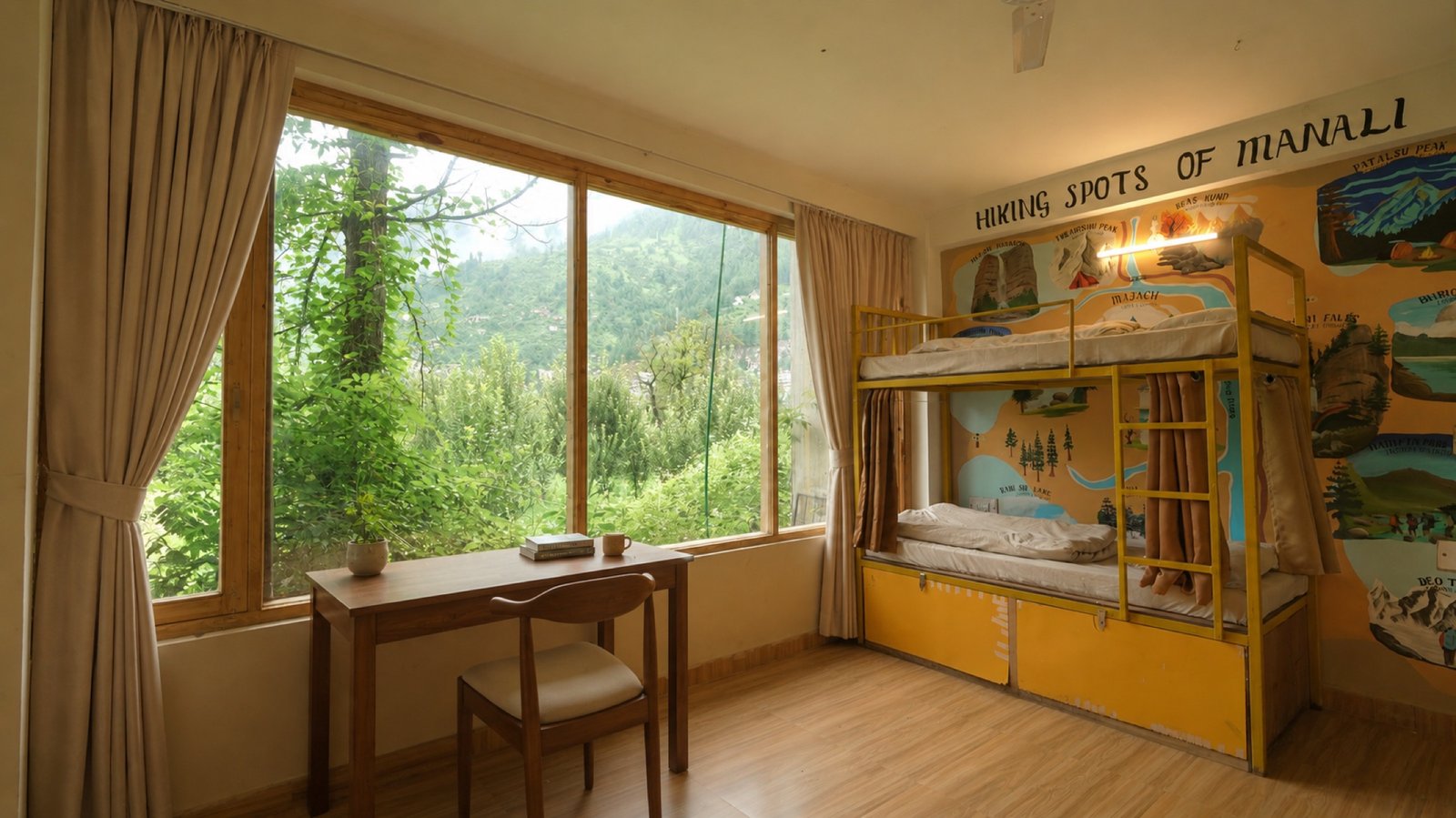 Second angle of Safar Hostel's 4-bed dorm showing bunks, desk and garden-facing window